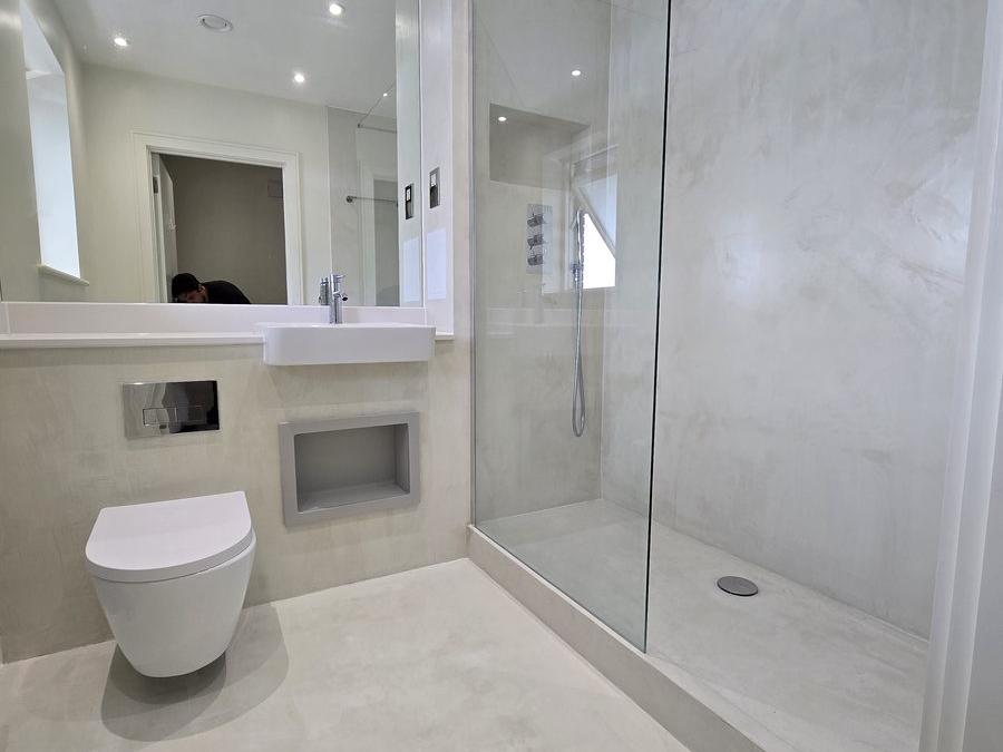 Second view of the Bermondsey bathroom showing the vanity, mirror and heated towel rail