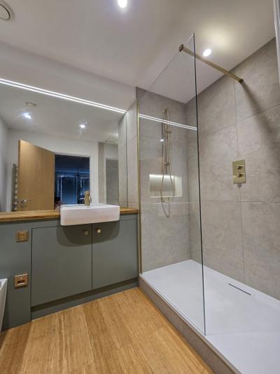 Dalston en-suite bathroom second angle with walk-in shower and brushed brass fittings