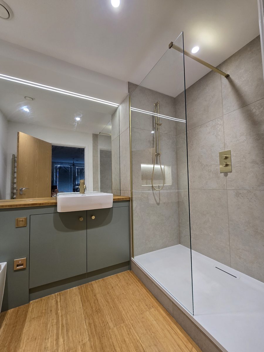 Dalston en-suite bathroom second angle with walk-in shower and brushed brass fittings